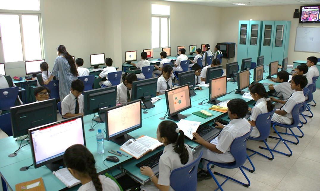 Students in computer lab learning coding